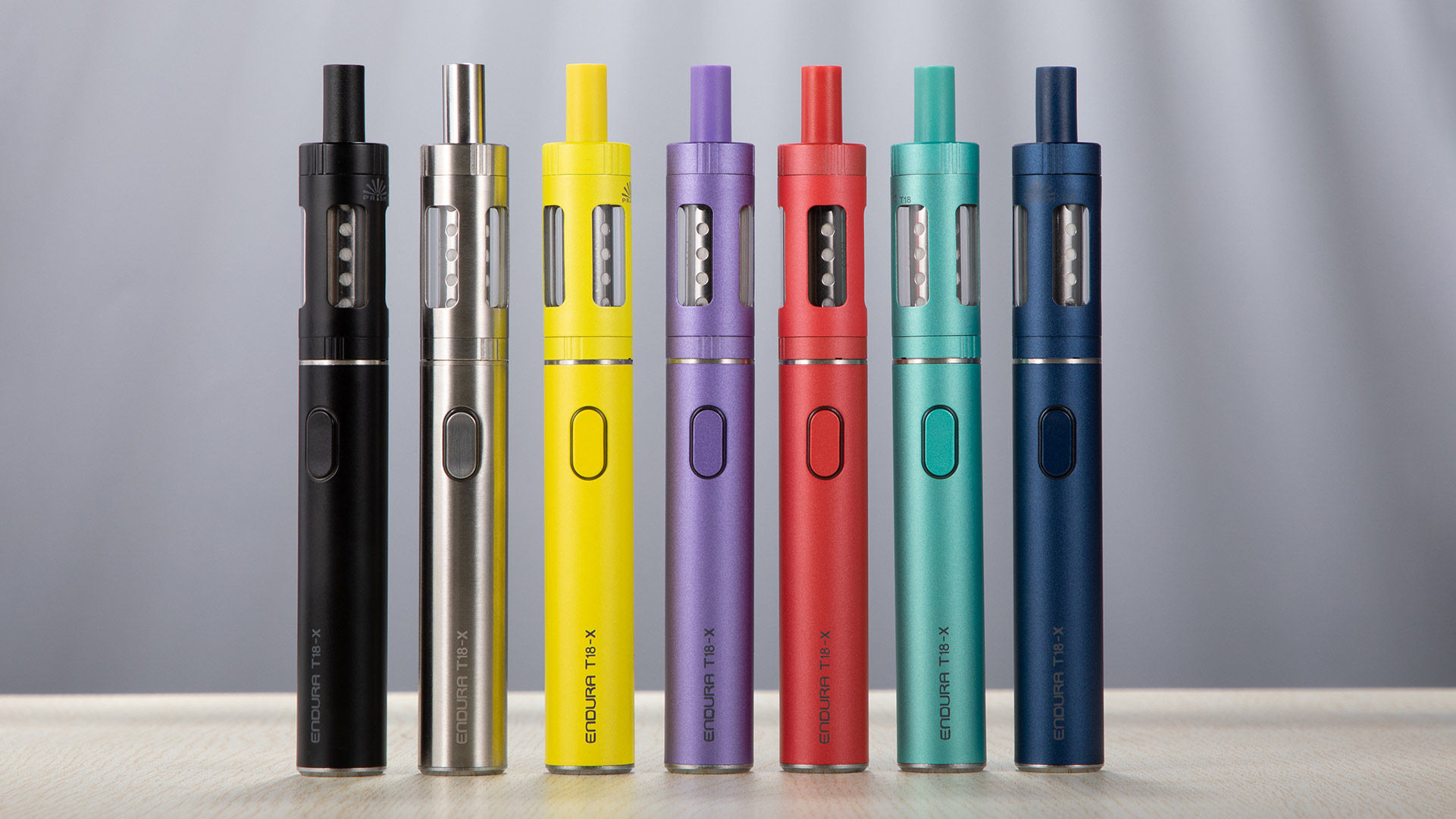 Eine Reihe von farbenfrohen Innokin Endura T18X Vapes, die diskrete Vaping-Optionen präsentieren.