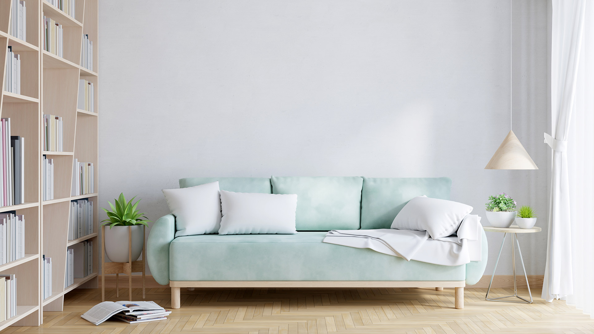 Eine moderne Wohnzimmerecke mit einem hellgrünen Dreisitzer-Sofa, weißen Kissen und grünen Pflanzen, die ein modernes Lebensgefühl vermitteln.